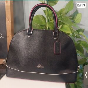 COACH Black Leather Satchel with Pink Accents
No crossbody strap